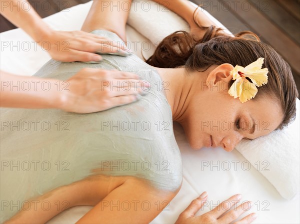 Woman receiving spa treatment