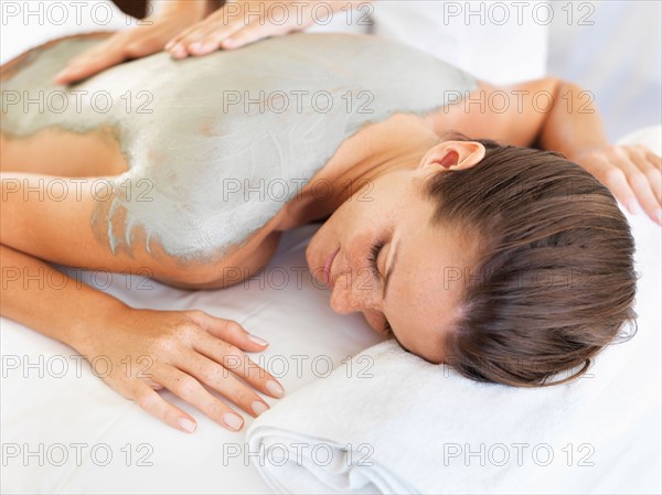 Woman receiving spa treatment