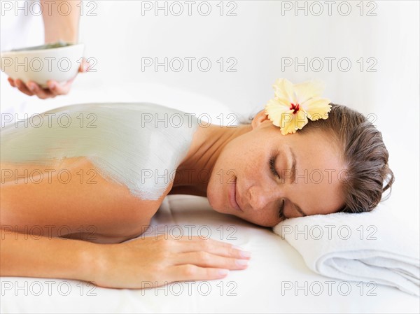 Woman receiving spa treatment