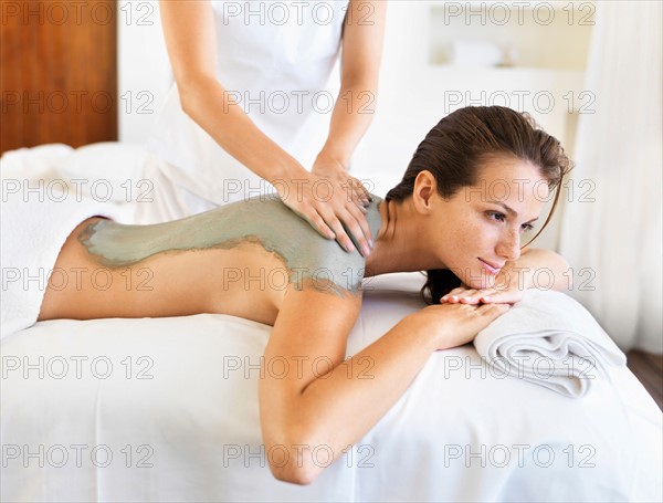 Woman receiving spa treatment