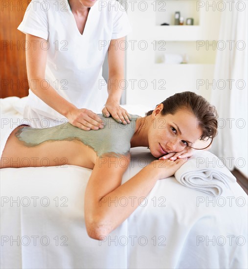 Woman receiving spa treatment