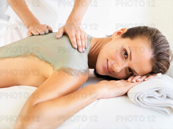 Woman receiving spa treatment