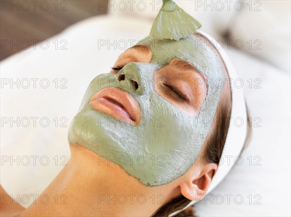 Woman receiving face spa therapy