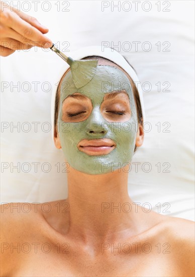 Woman receiving face spa therapy