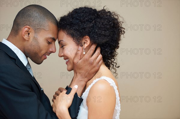 Bride and groom embracing