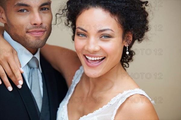 Bride and groom embracing