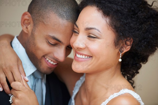 Bride and groom embracing