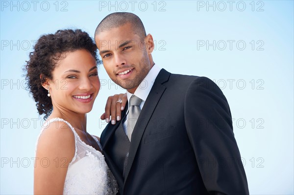 Portrait of newlywed couple