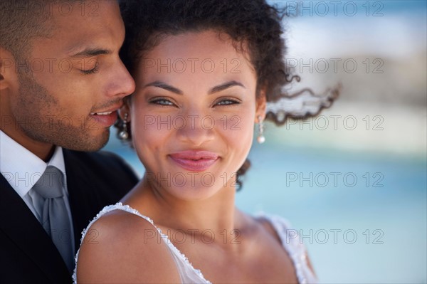 Portrait of newlywed couple