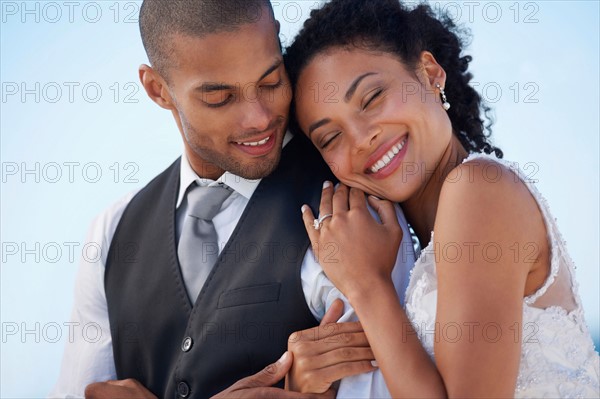 Portrait of newlywed couple