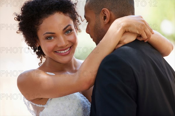 Portrait of newlywed couple