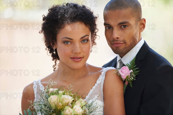 Portrait of newlywed couple