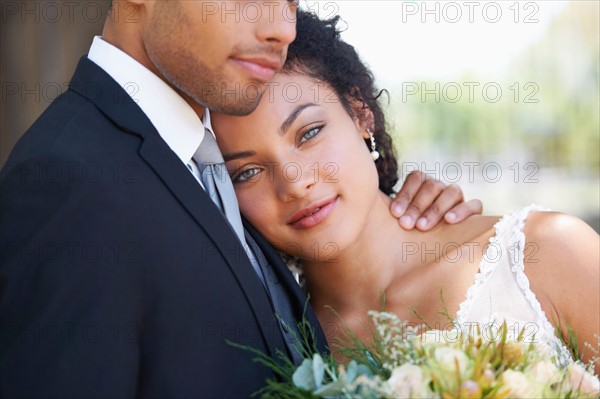 Portrait of newlywed couple