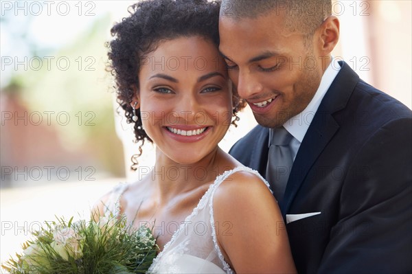 Portrait of newlywed couple