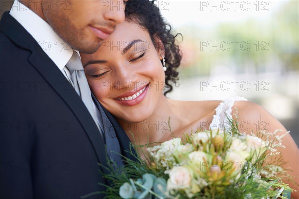 Portrait of newlywed couple