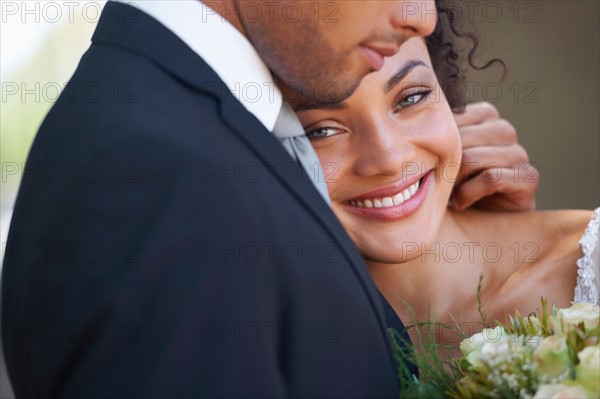 Portrait of newlywed couple