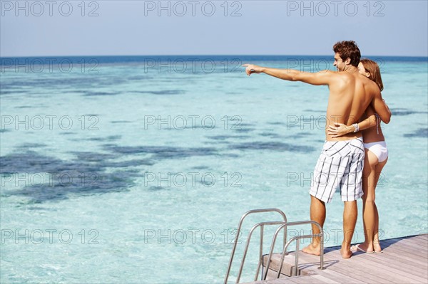 Couple at swimming pool