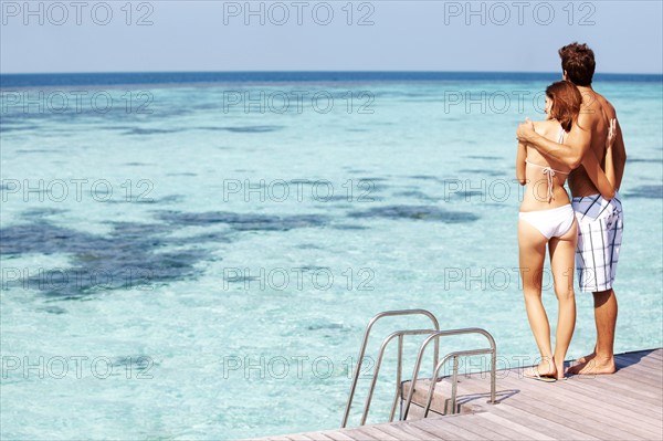 Couple at swimming pool