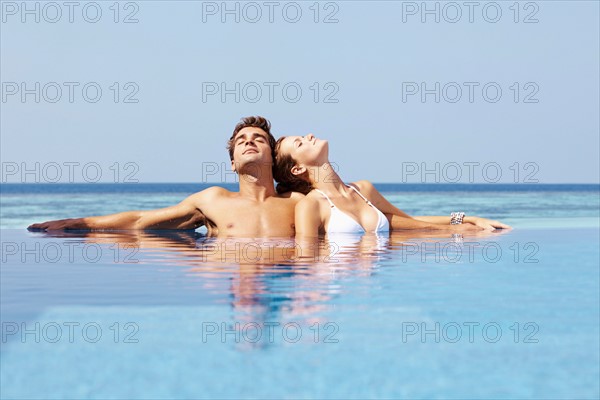 Couple at swimming pool