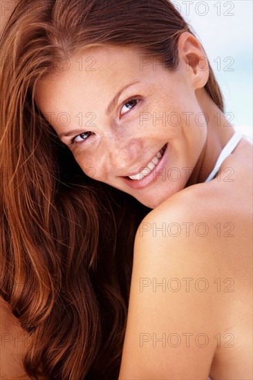 Portrait of young smiling woman