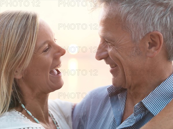 Portrait of mature couple at sunset