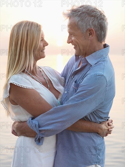 Portrait of mature couple at sunset