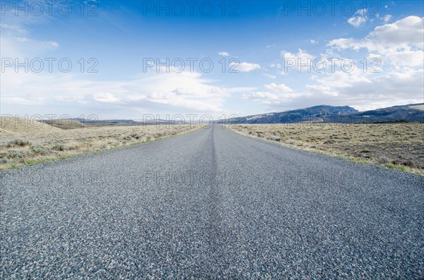 Road going through desolate landscape