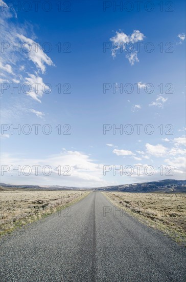 Road going through desolate landscape