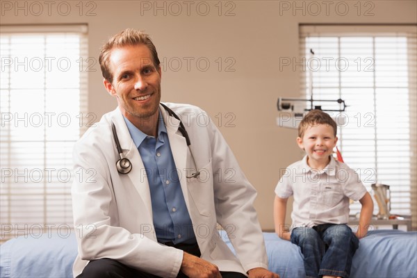 Pediatrician and boy (2-3)