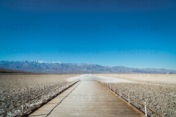 Wooden pier on desert