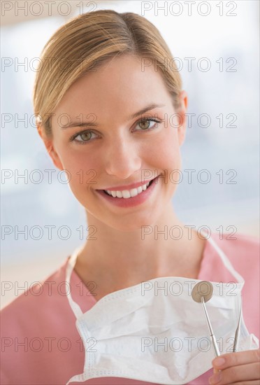 Portrait of female dentist.