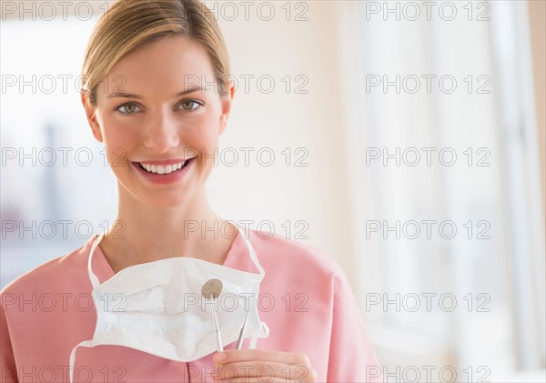 Portrait of female dentist.