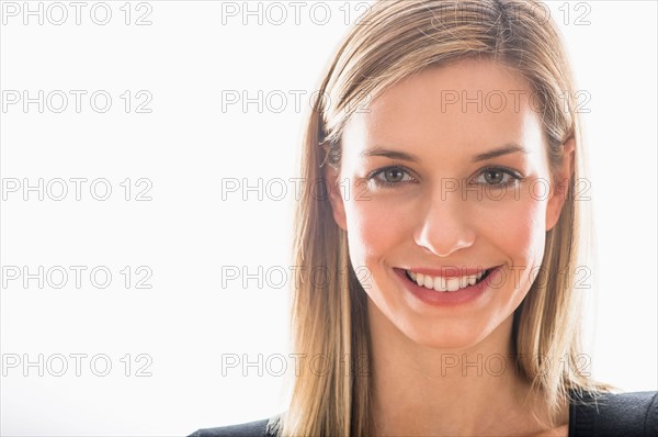 Studio portrait of young woman.