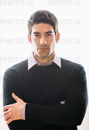 Studio portrait of mid adult man.