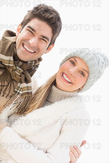 Portrait of couple in winter clothing.