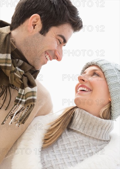 Portrait of couple in winter clothing.