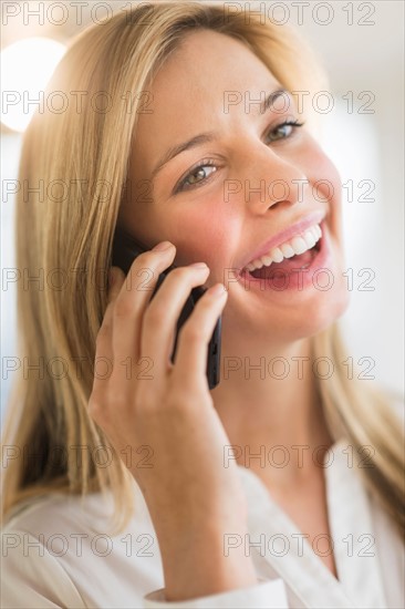 Woman talking on phone.