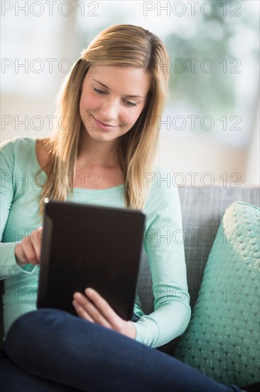 Woman using tablet pc.