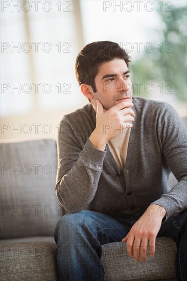 Portrait of mid adult man at home.