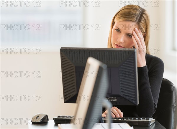 Business woman working in office.