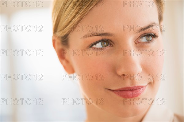 Studio portrait of young woman.