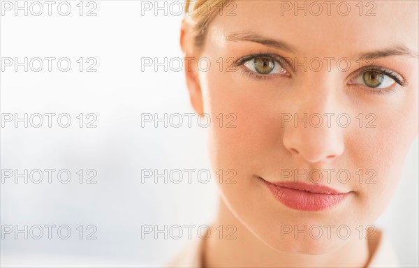 Studio portrait of young woman.