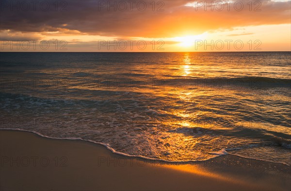 Sun setting over sea. Jamaica.