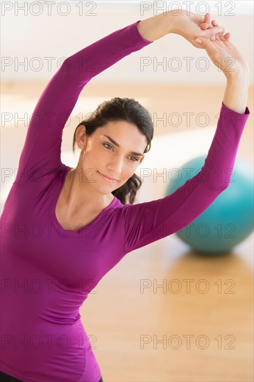 Young woman exercising.