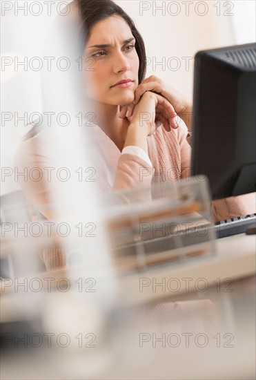 Businesswoman working on computer.