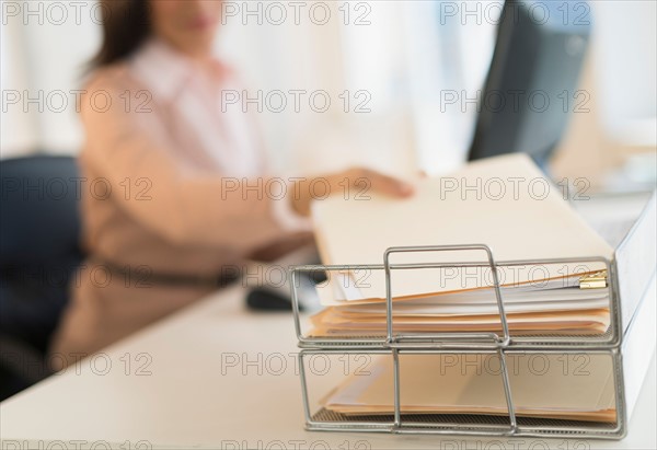 Businesswoman working on computer.