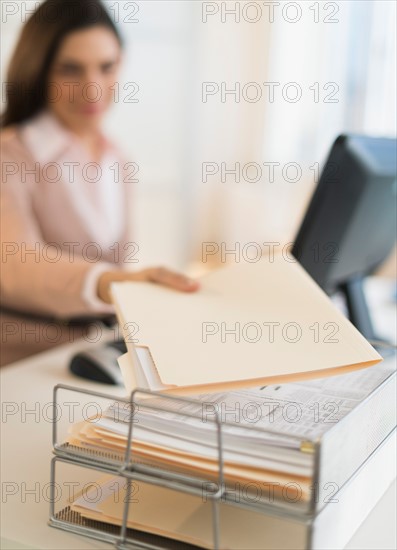 Businesswoman working on computer.