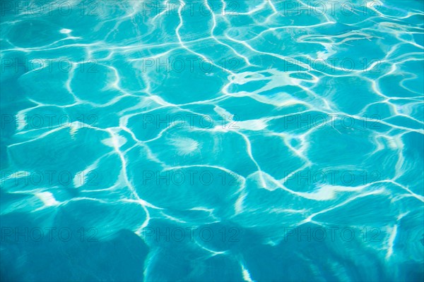 Water in swimming pool.