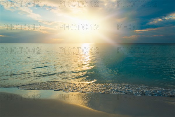 Sun setting over sea. Jamaica.