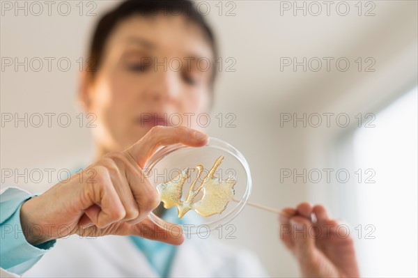 Woman working in laboratory.